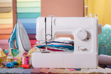 Sewing machine, sewing accessories and samples of fabric