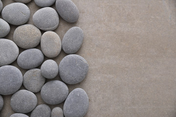 Fototapeta na wymiar stones on gray background