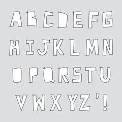Hand drawn alphabet on grey background