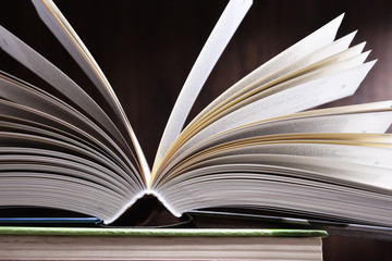 Composition with open book on the table