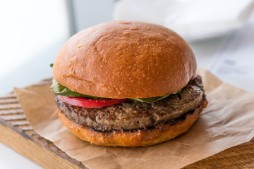 small hamburger on a wooden base