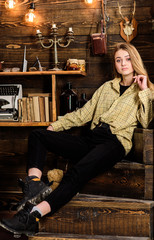 Lady on dreamy face in plaid clothes looks cute and casual. Girl tomboy spend time in house of...