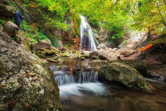 Djur-djur waterfall is located on the Ulu-Uzen river in the Crimea. Photographer takes pictures of landscapes. Spring rill flow. Nature composition.