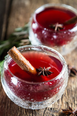 Refreshing cherry fruit drink with cinnamon and badan © Ruslan Mitin