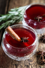 Refreshing cherry fruit drink with cinnamon and badan © Ruslan Mitin
