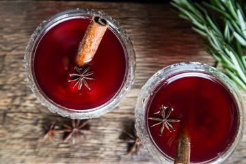 Refreshing cherry fruit drink with cinnamon and badan © Ruslan Mitin
