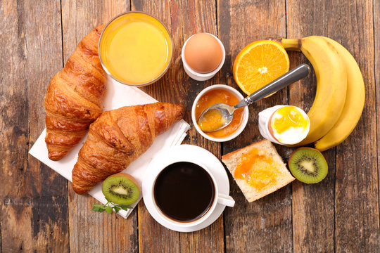 Breakfast With Coffee, Egg, Croissant And Fruit