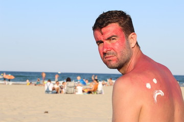 Man suffering the consequences of too much uv light exposure 