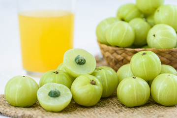 Indian gooseberry on wooden table