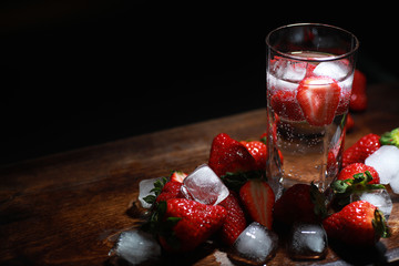 Fresh ripe strawberries on a wooden table