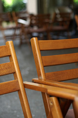 Wooden chairs at the terrace, daytime