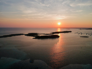 Fototapeta na wymiar The sunset over Porto Cesario, Puglia, Italy. Drone HDR photo