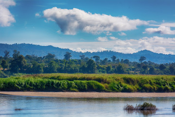 Forests, mountains and blue cloudy sky are landscape in Thailand.