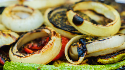 Grilled vegetables on a grill pan, top view
