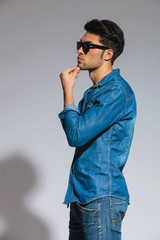 side view of ensive casual man with sunglasses
