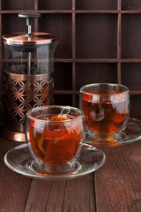 Still life with tea cup on wooden background