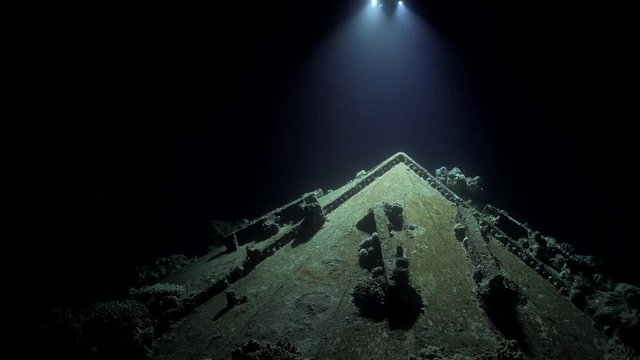 Cousteau's underwater world  the pre continent. Light moving over the submarine 