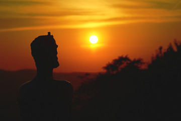 Sunset with statue