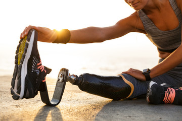 Cropped image of fit disabled athlete woman