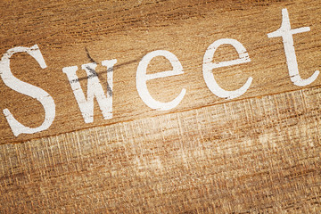 Sweet on Wooden Background