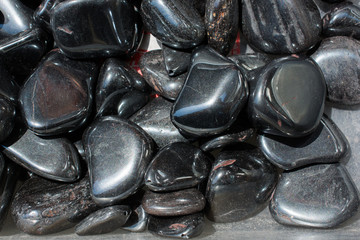 metallic gray tumbled hematite gemstone as  mineral rock