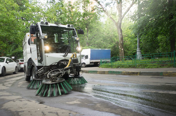 A street sweeper machine cleaning the streets
