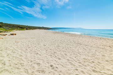 Fototapeta na wymiar White sand in Le Bombarde beach in Alghero
