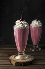 Cherry milkshakes with whipped cream 