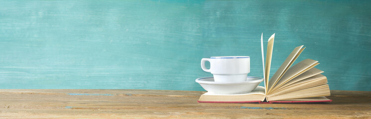 Open Book and a cup of coffee, panorama, good copy space