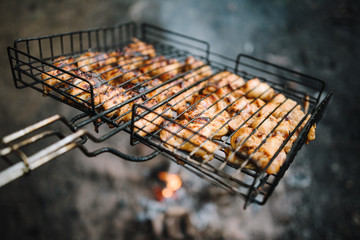 Fresh meat on grill outdoors