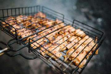 Fresh meat on grill outdoors