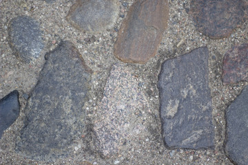 An old boulder road rock granite texture