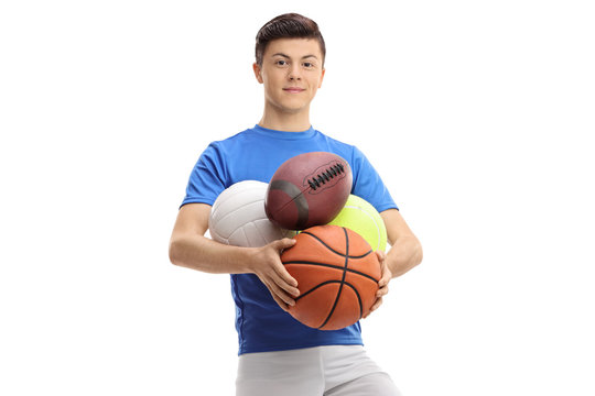 Teenage boy with sports balls
