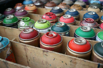 colorful spray cans