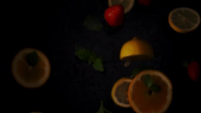 Fresh fruits frozen in mid-air. Shooted in super slow motion