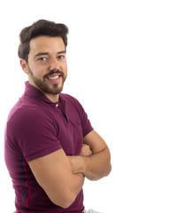Friendly man is smiling. Beautiful and bearded person. He is wearing a magenta polo shirt.