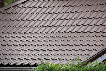 Brown tiles on the roof of the house