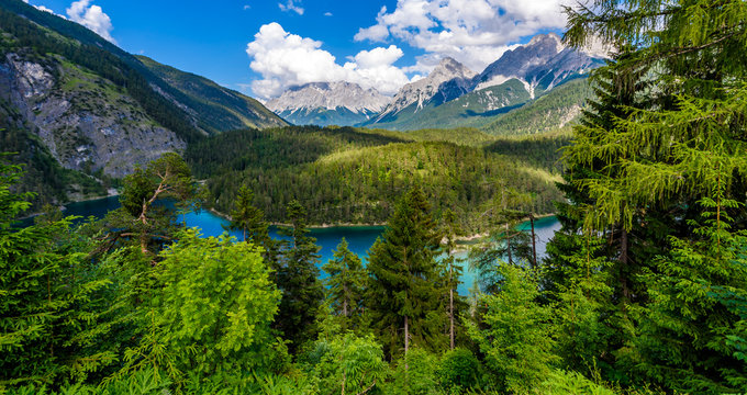 Beautiful mountain scenery and panoramic view from the Rest Area "Zugspitzblick" at the Fernpass alpine road to the Zugspitze Mountain and Lake Blindsee, Alps, Austria, Europe
