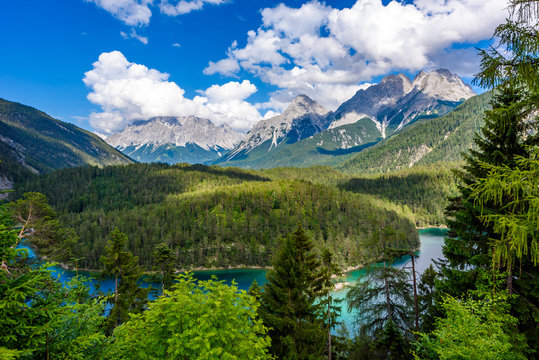 Beautiful mountain scenery and panoramic view from the Rest Area "Zugspitzblick" at the Fernpass alpine road to the Zugspitze Mountain and Lake Blindsee, Alps, Austria, Europe