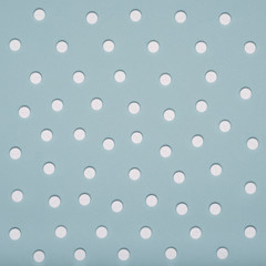 White pills on blue pastel colored background. Medication and prescription pills minimal background.