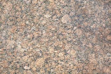 Closeup texture of red natural granite.