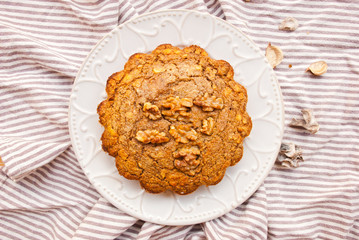 Homemade cake with nuts and dry fruits from oat flour. Healthy food. Food background.