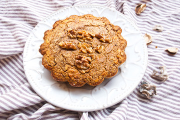 Homemade cake with nuts and dry fruits from oat flour. Healthy food. Food background.