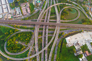 Intersection infinity sign traffic road with car and green park pond