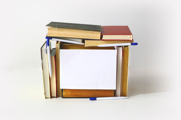 frame for message from a pile of books on a light background