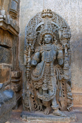 Close up of dwarapala on the left side of the North entrance, Hoysaleshvara Temple, Halebid, Karnataka