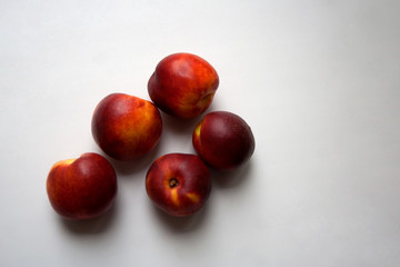 Nectarine fruits isolated on white background close up