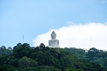 Statue white big buddha famous on peak mountain in phuket