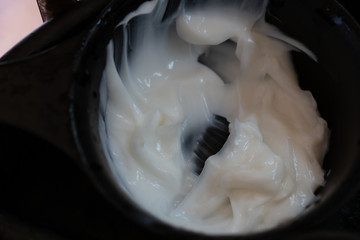 Background of Barber supplies, applying color cream at hair in salon.