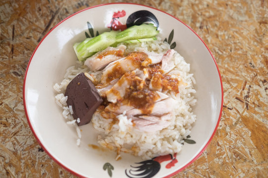 Rice steamed with chicken soup (hainanese chicken rice)